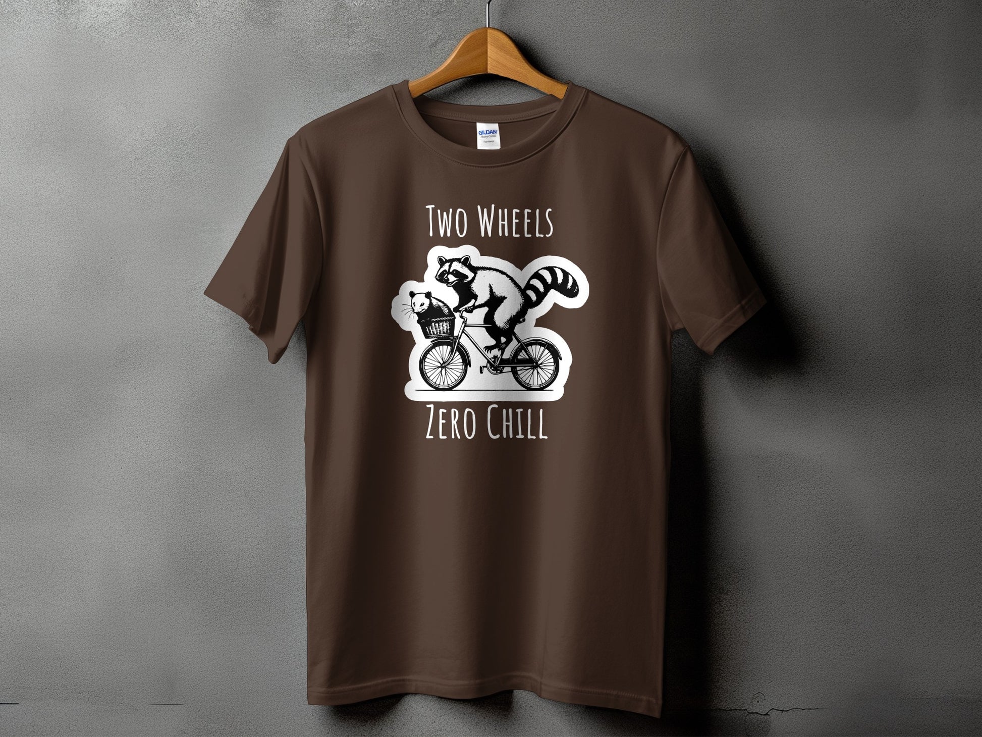 Two Wheels Zero Chill Raccoon Riding Bike T-Shirt Product